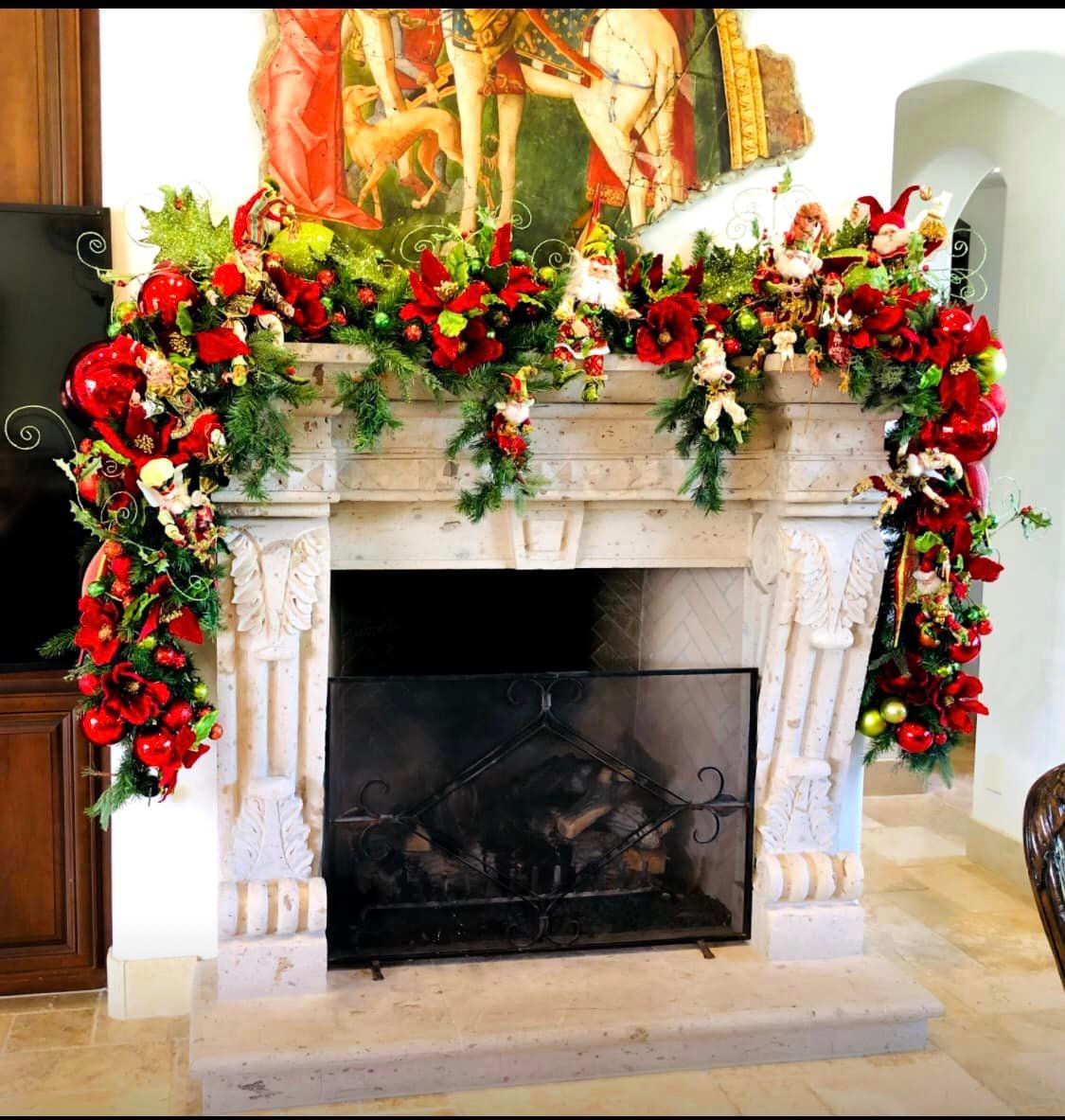 Luxury holiday mantel garland with red florals and greenery